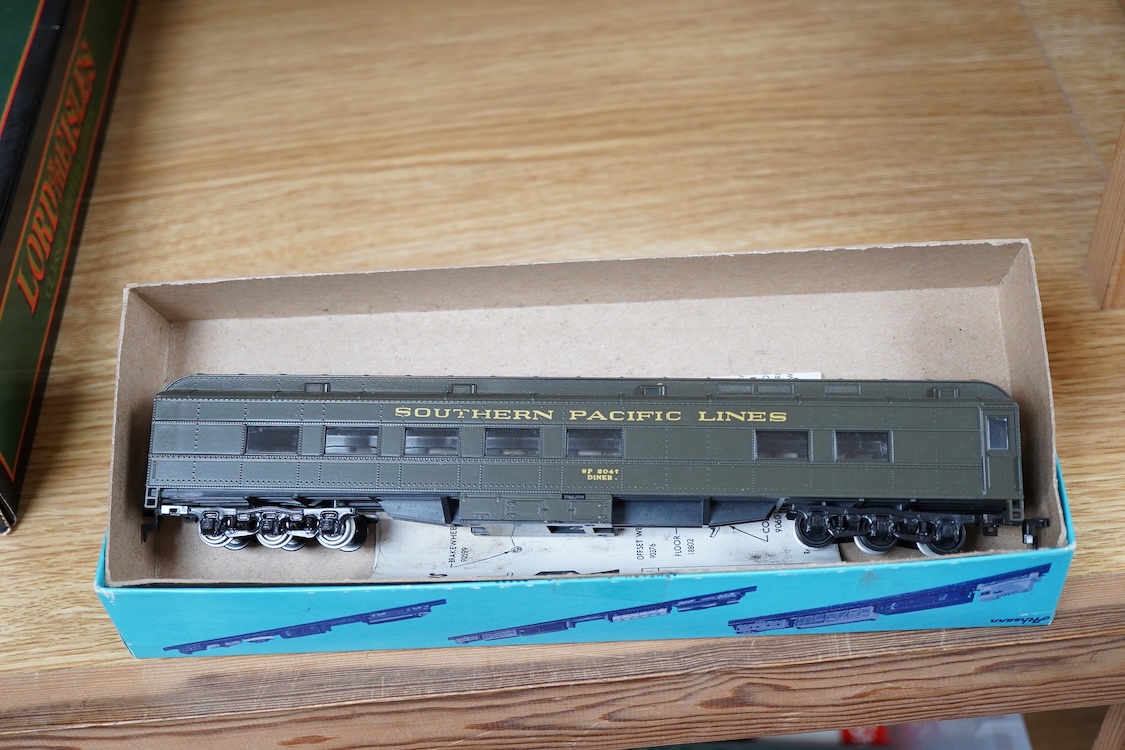 A quantity of US outline HO railway by Athearn, Bachmann, etc. including three locomotives; a Union Pacific Bo-Bo diesel, 1468, a Santa Fe Bo-Bo diesel, 5707, and a Santa Fe 0-4-0 tender engine, together with a 12-wheel